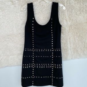 Ellison studded mini dress. Hugs body comfortably.